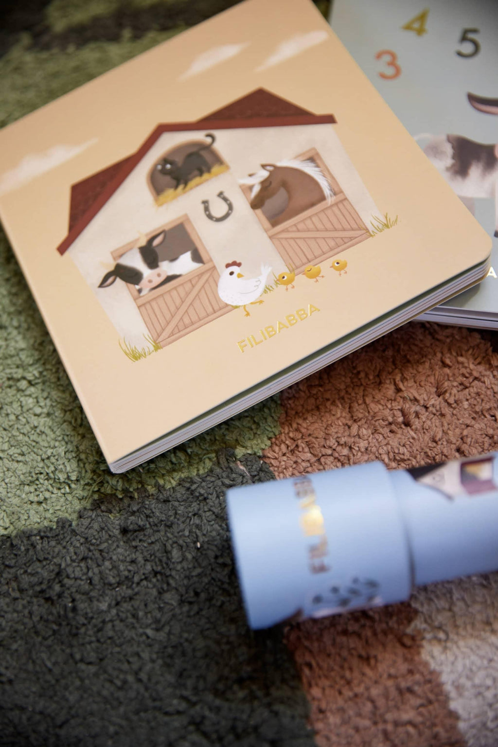 Baby book Filibabba Magic Farm